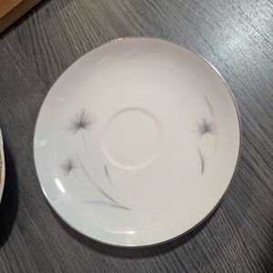 Chic White Saucer with Subtle Gray Floral Pattern